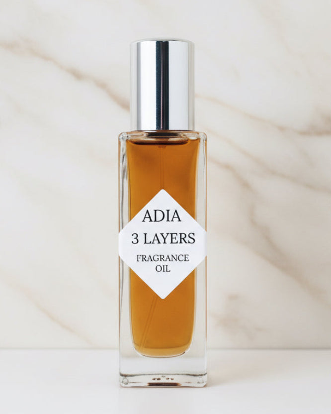 Travel-friendly natural fragrance oil in a square shaped roll-on bottle that has a a unique blend of rich amber oils and a crisp, clean essential oil blend.