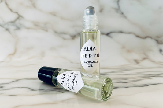 Travel-friendly natural fragrance oil made with light amber and a clean, masculine essential oil blend.