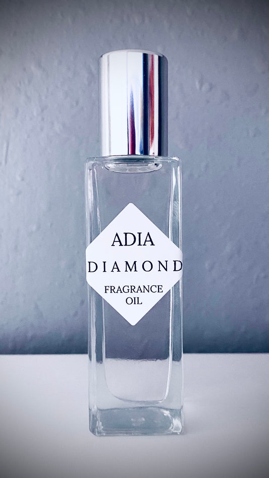 Travel-friendly natural fragrance oil in a square shaped, roll-on bottle that is delicate and refreshing with an alluring aura.
