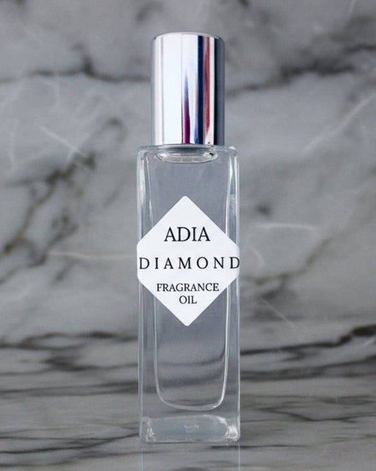 Travel-friendly natural fragrance oil in a square shaped, roll-on bottle that is delicate and refreshing with an alluring aura.