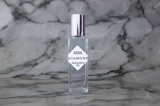 Travel-friendly natural fragrance oil in a square shaped, roll-on bottle that is delicate and refreshing with an alluring aura.