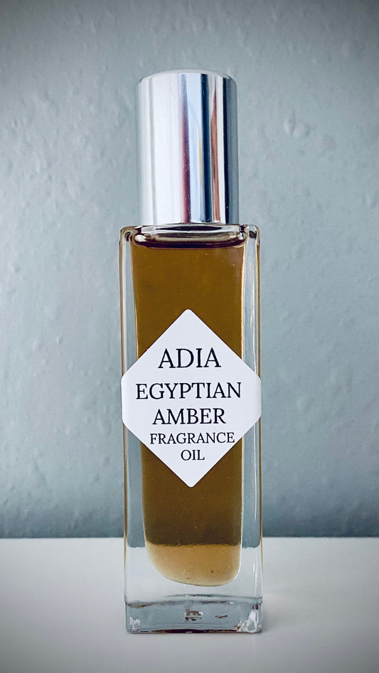 Travel-friendly natural fragrance oil in a square shaped roll-on bottle that has a warm vanilla base, complemented by a citrus and floral mix of essential oils.