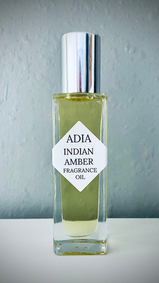 Travel-friendly natural fragrance oil in a square shaped roll-on bottle, made with a clean essential oil blend that is purposefully crafted as a modern cologne oil.