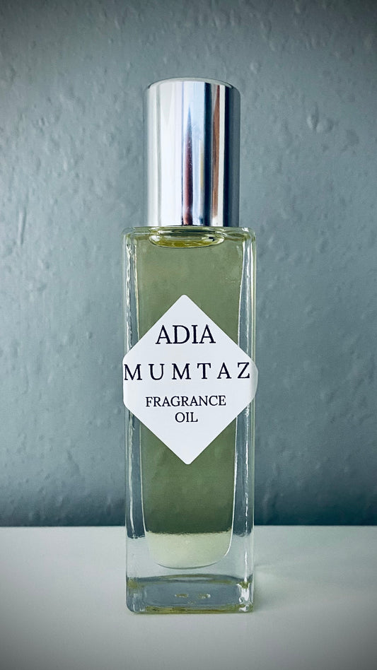 Travel-frtendly natural fragrance oil in a square shaped roll-on bottle that is lightly-sweetened, floral, and long-lasting.