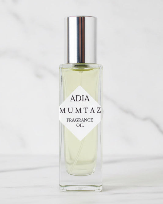 Travel-frtendly natural fragrance oil in a square shaped roll-on bottle that is lightly-sweetened, floral, and long-lasting.
