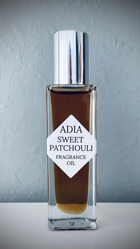 Travel-friendly natural fragrance oil in a square shaped, roll-on bottle that is made with a sweet amber oil and classic, wild-crafted Patchouli essential oil.