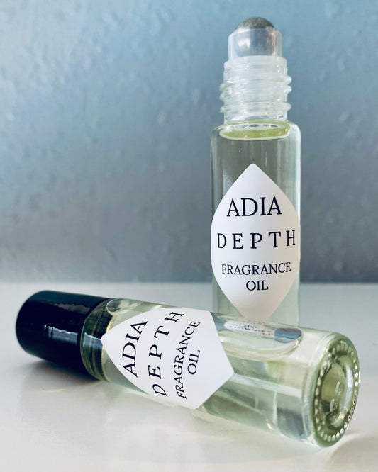 Travel-friendly natural fragrance oil made with light amber and a clean, masculine essential oil blend.